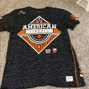 Men’s XL American fighter shirt.